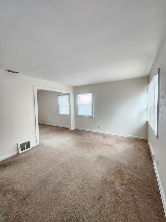 empty room with carpet floors