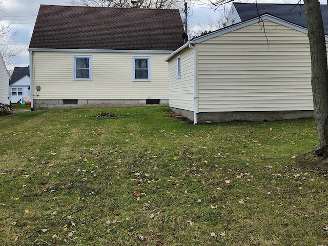 view of property exterior with a lawn