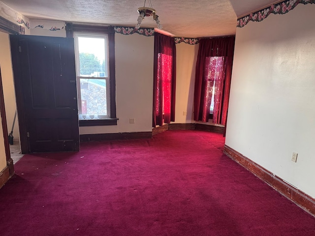 325 E Mansfield St, Bucyrus, OH 44820 - unfurnished room with carpet flooring and a textured ceiling