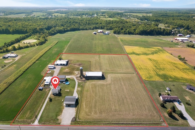 birds eye view of property featuring a rural view