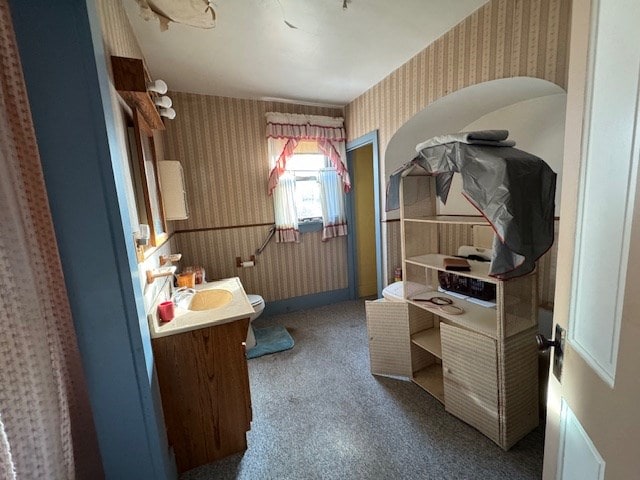 bathroom with vanity and toilet