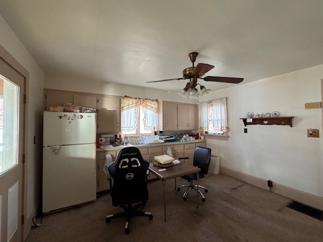 unfurnished office featuring carpet floors