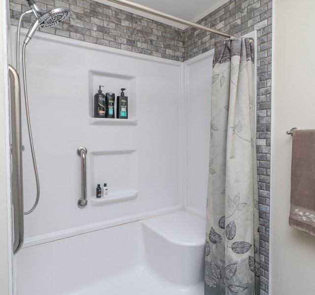 full bath with a shower with shower curtain