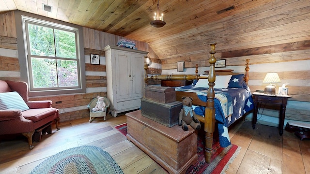 609 Mcbride Rd, Mansfield, OH 44905 - bedroom with light wood finished floors, vaulted ceiling, wooden walls, and wooden ceiling