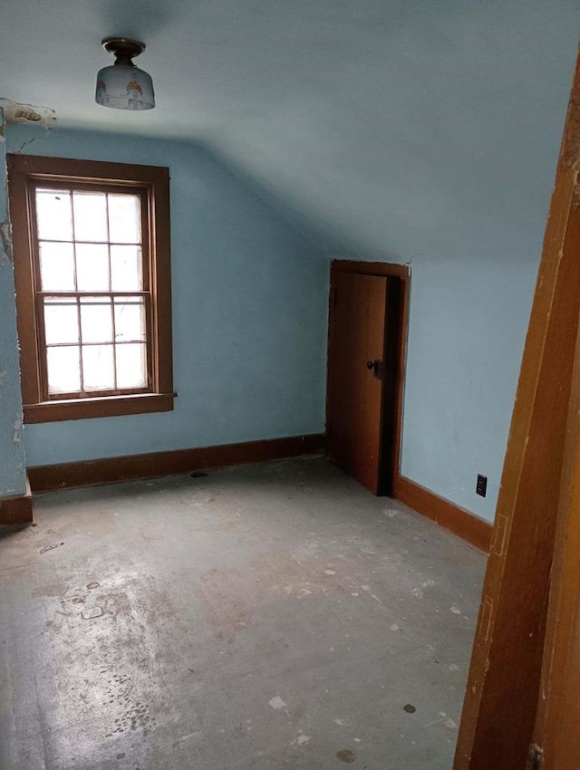 additional living space with lofted ceiling