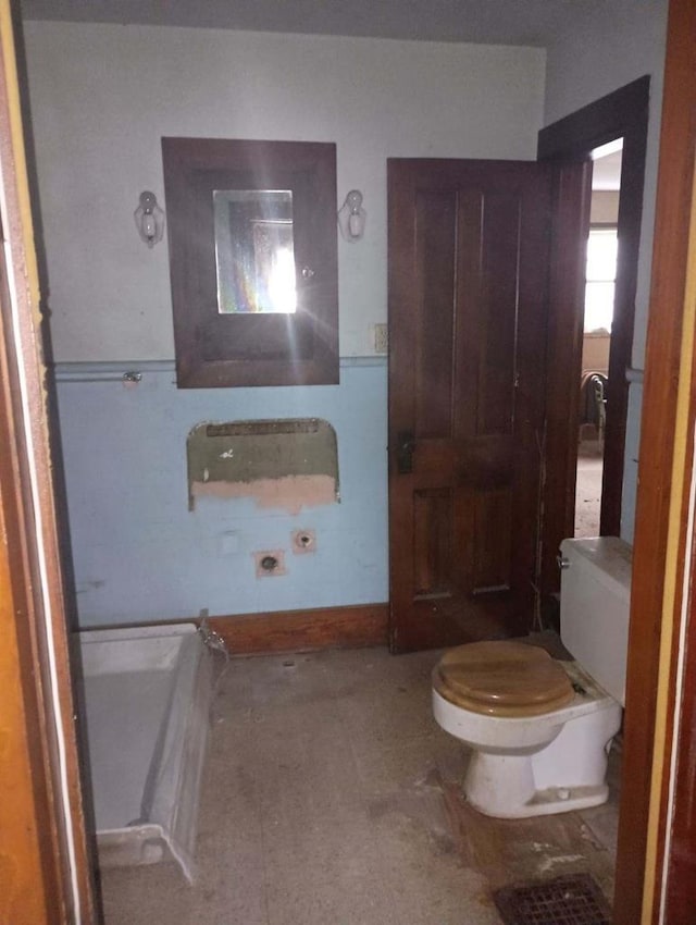 bathroom featuring toilet