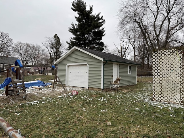 garage with a lawn