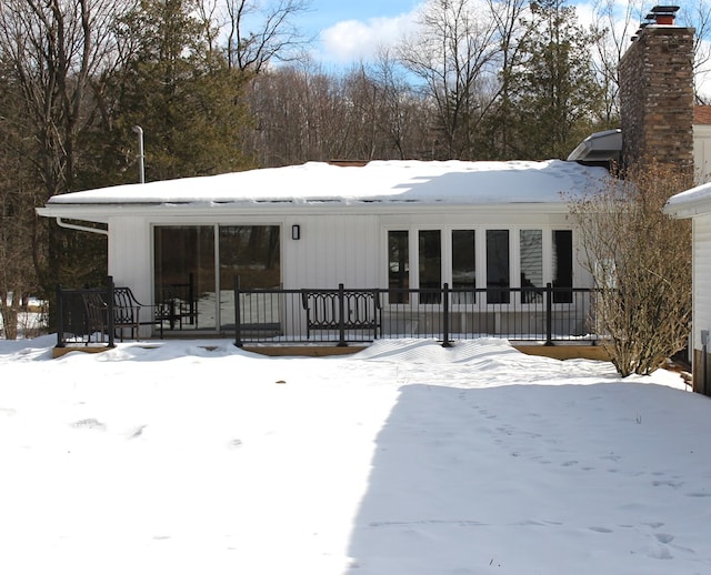 view of snow covered property