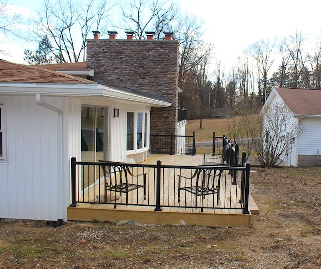 wooden deck featuring fence