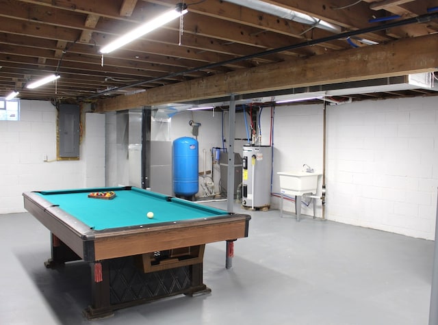 game room with billiards, electric panel, concrete flooring, a sink, and electric water heater