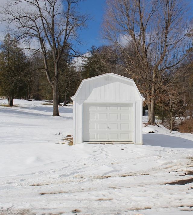 view of snow covered garage