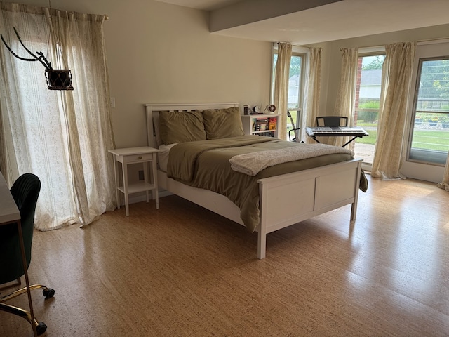 380 Tidd Dr, Galion, OH 44833 - bedroom with access to exterior and light wood-style floors