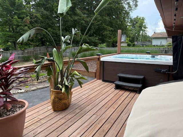 380 Tidd Dr, Galion, OH 44833 - wooden deck featuring a hot tub and a fenced backyard