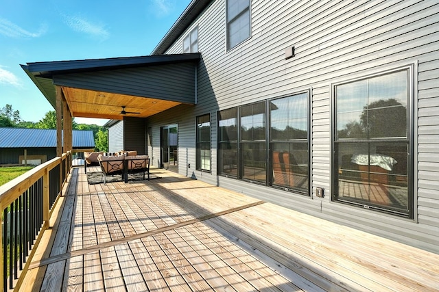 1360 Lexington Ontario Rd, Mansfield, OH 44904 - wooden terrace featuring a ceiling fan, outdoor dining area, and an outdoor living space