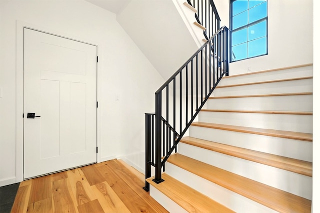1360 Lexington Ontario Rd, Mansfield, OH 44904 - stairs featuring wood finished floors and baseboards