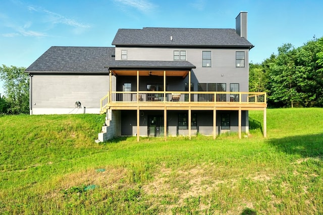 1360 Lexington Ontario Rd, Mansfield, OH 44904 - back of property with a wooden deck, a chimney, and a lawn