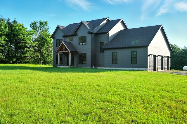 1360 Lexington Ontario Rd, Mansfield, OH 44904 - view of front facade with a garage and a front lawn