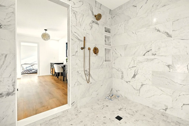 1360 Lexington Ontario Rd, Mansfield, OH 44904 - full bath featuring a tile shower and wood finished floors