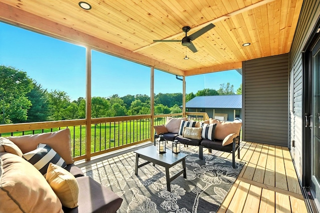 1360 Lexington Ontario Rd, Mansfield, OH 44904 - wooden terrace with an outdoor hangout area, a ceiling fan, and view of wooded area