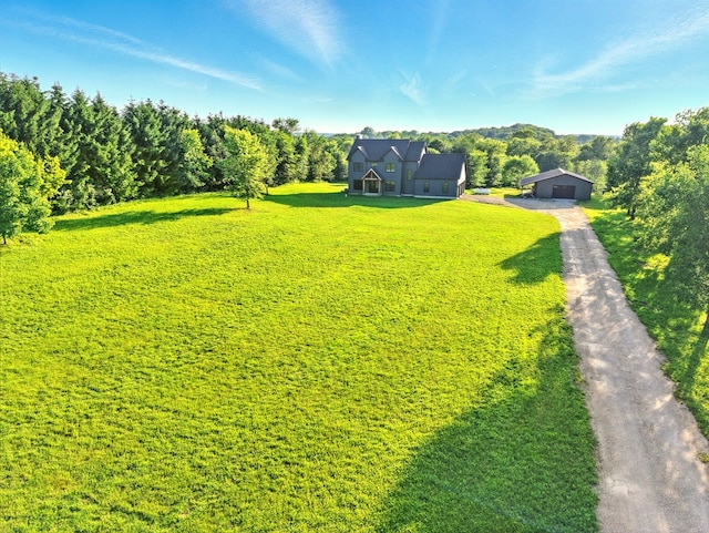 1360 Lexington Ontario Rd, Mansfield, OH 44904 - view of green lawn with an outbuilding, a detached garage, and a pole building