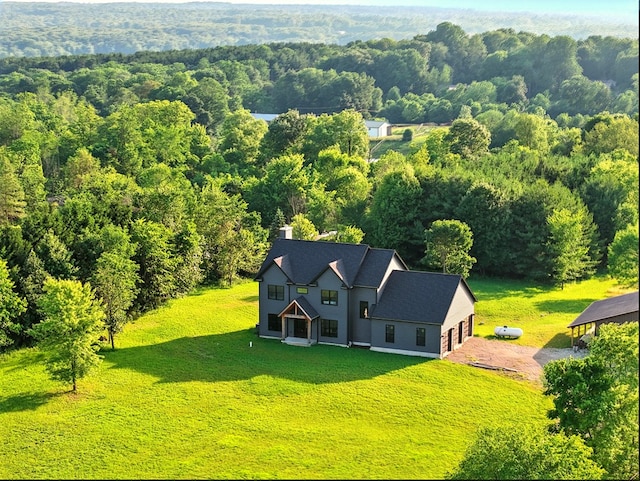 1360 Lexington Ontario Rd, Mansfield, OH 44904 - aerial view of property and surrounding area with a heavily wooded area