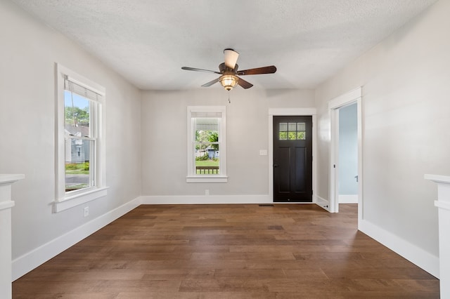519 Park Ave, Galion, OH 44833 - foyer entrance with wood finished floors, ceiling fan, and a textured ceiling