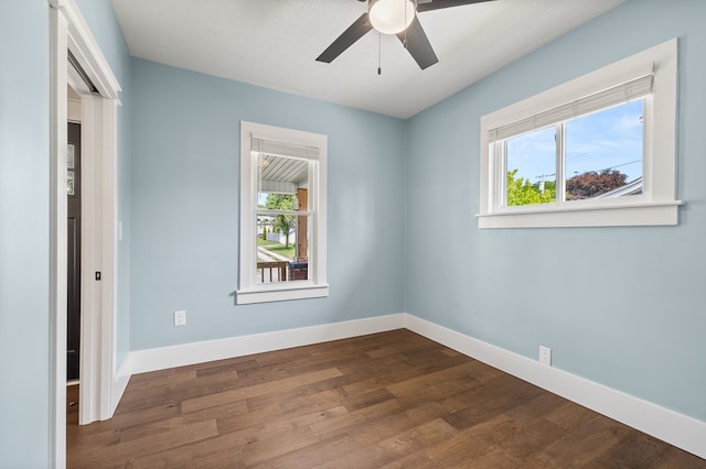 519 Park Ave, Galion, OH 44833 - unfurnished bedroom featuring dark wood finished floors and a ceiling fan