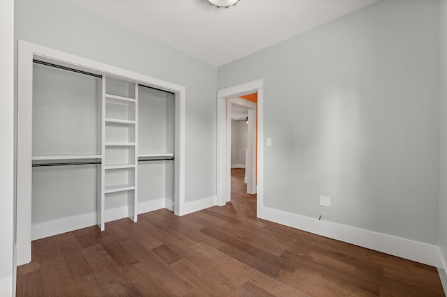 519 Park Ave, Galion, OH 44833 - unfurnished bedroom featuring dark wood finished floors and a closet