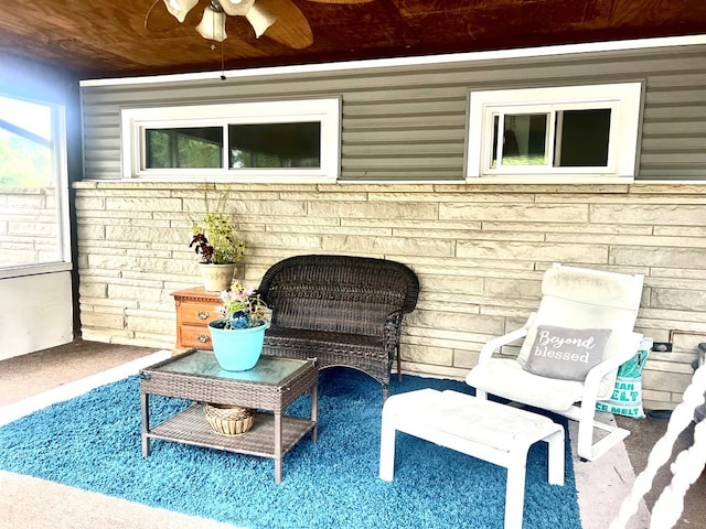 view of patio featuring ceiling fan