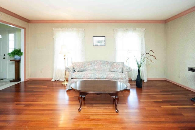 452 Pleasant Ln, Bucyrus, OH 44820 - sitting room featuring wood finished floors, crown molding, and baseboards