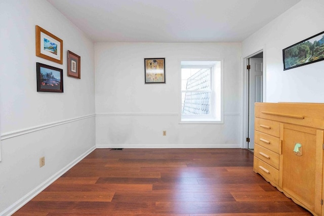 452 Pleasant Ln, Bucyrus, OH 44820 - interior space with wood finished floors, visible vents, and baseboards