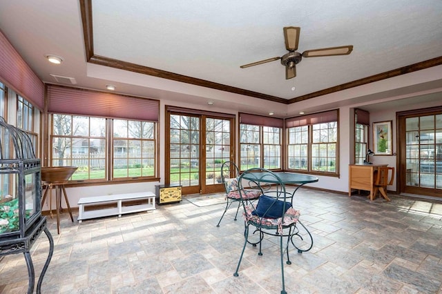 452 Pleasant Ln, Bucyrus, OH 44820 - playroom featuring a ceiling fan, baseboards, stone tile flooring, and a wood stove