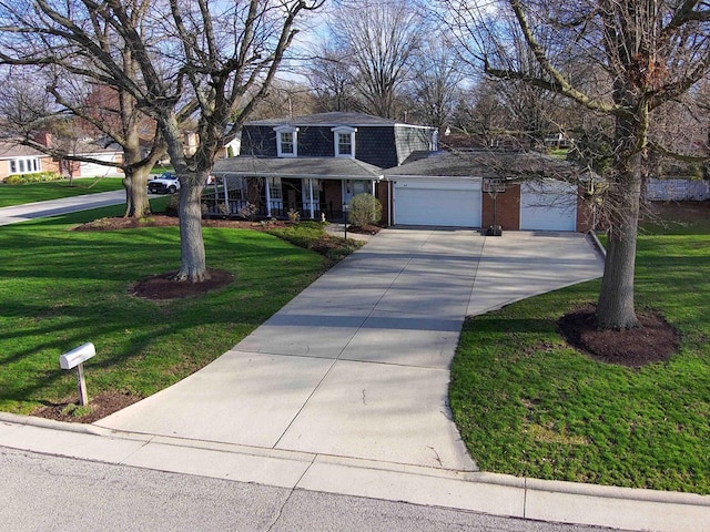 452 Pleasant Ln, Bucyrus, OH 44820 - traditional-style home with an attached garage, driveway, covered porch, and a front yard