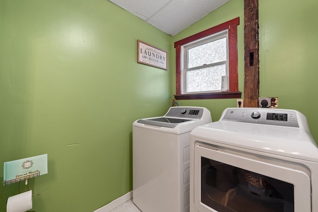 laundry room featuring separate washer and dryer