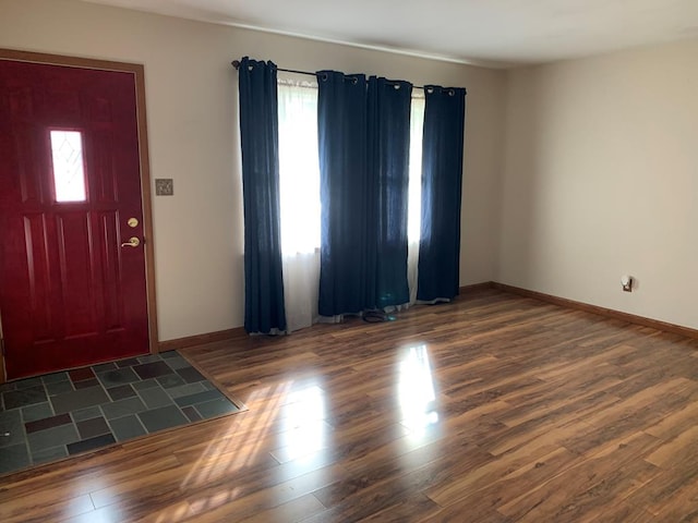 1149 Robinhood Dr, Bucyrus, OH 44820 - entrance foyer with healthy amount of natural light and wood finished floors