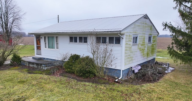 exterior space featuring a yard