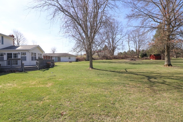 view of yard featuring a deck