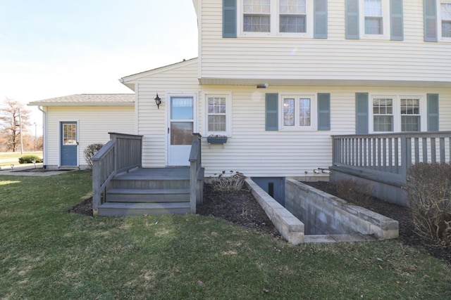 back of house featuring a yard