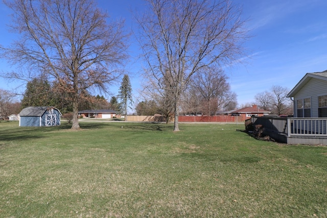 view of yard with an outbuilding and a storage unit