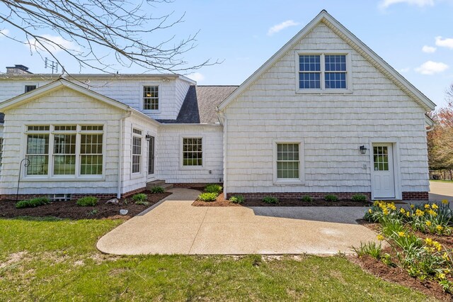 rear view of property with a patio