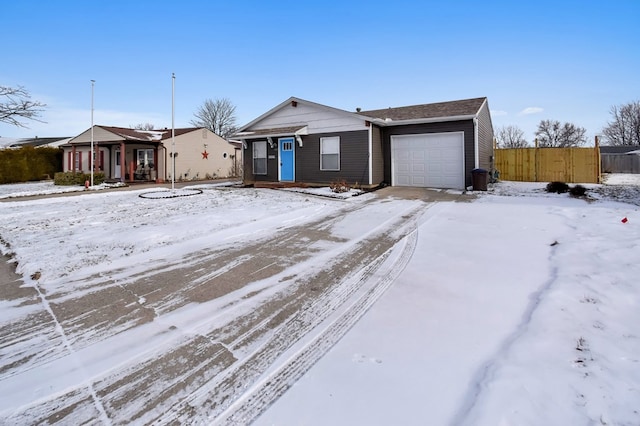 single story home with a garage