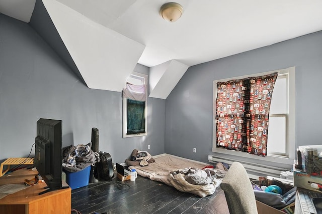 bedroom featuring wood finished floors