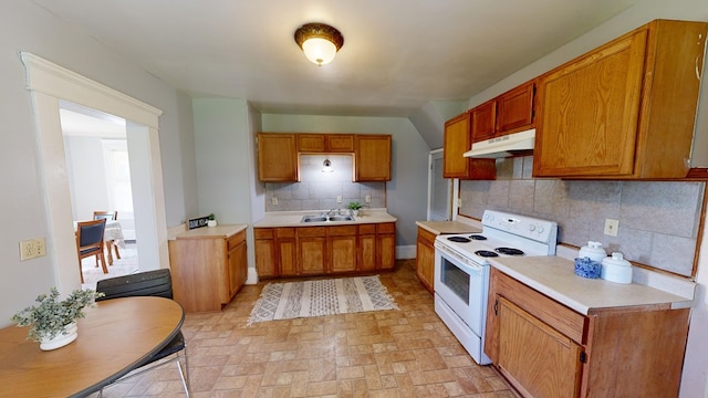 kitchen featuring white range with electric cooktop, sink, and tasteful backsplash