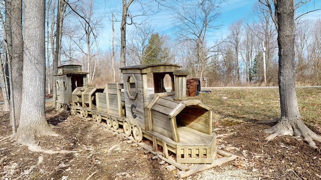 view of playground with an outdoor structure