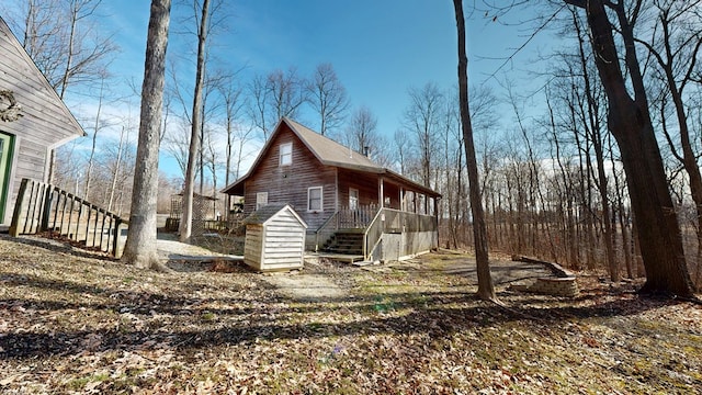 view of side of home with stairway