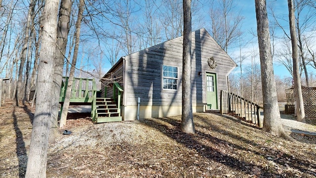 view of home's exterior featuring stairway