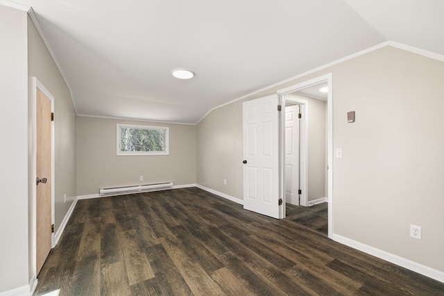 additional living space with a baseboard heating unit, lofted ceiling, wood finished floors, and baseboards