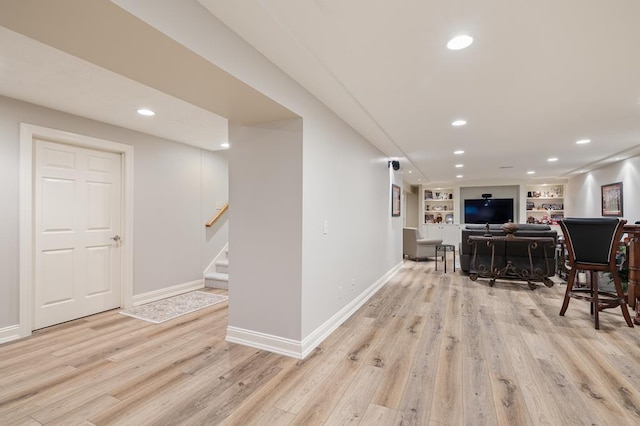 2313 Woodland Park Dr, Ontario, OH 44903 - interior space featuring light wood-type flooring, built in shelves, recessed lighting, and stairs