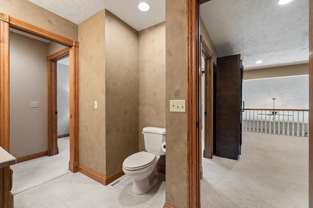 2313 Woodland Park Dr, Ontario, OH 44903 - bathroom featuring a textured ceiling, recessed lighting, and vanity