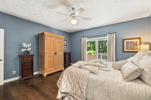 2313 Woodland Park Dr, Ontario, OH 44903 - bedroom with dark wood-style floors, ceiling fan, and a textured ceiling